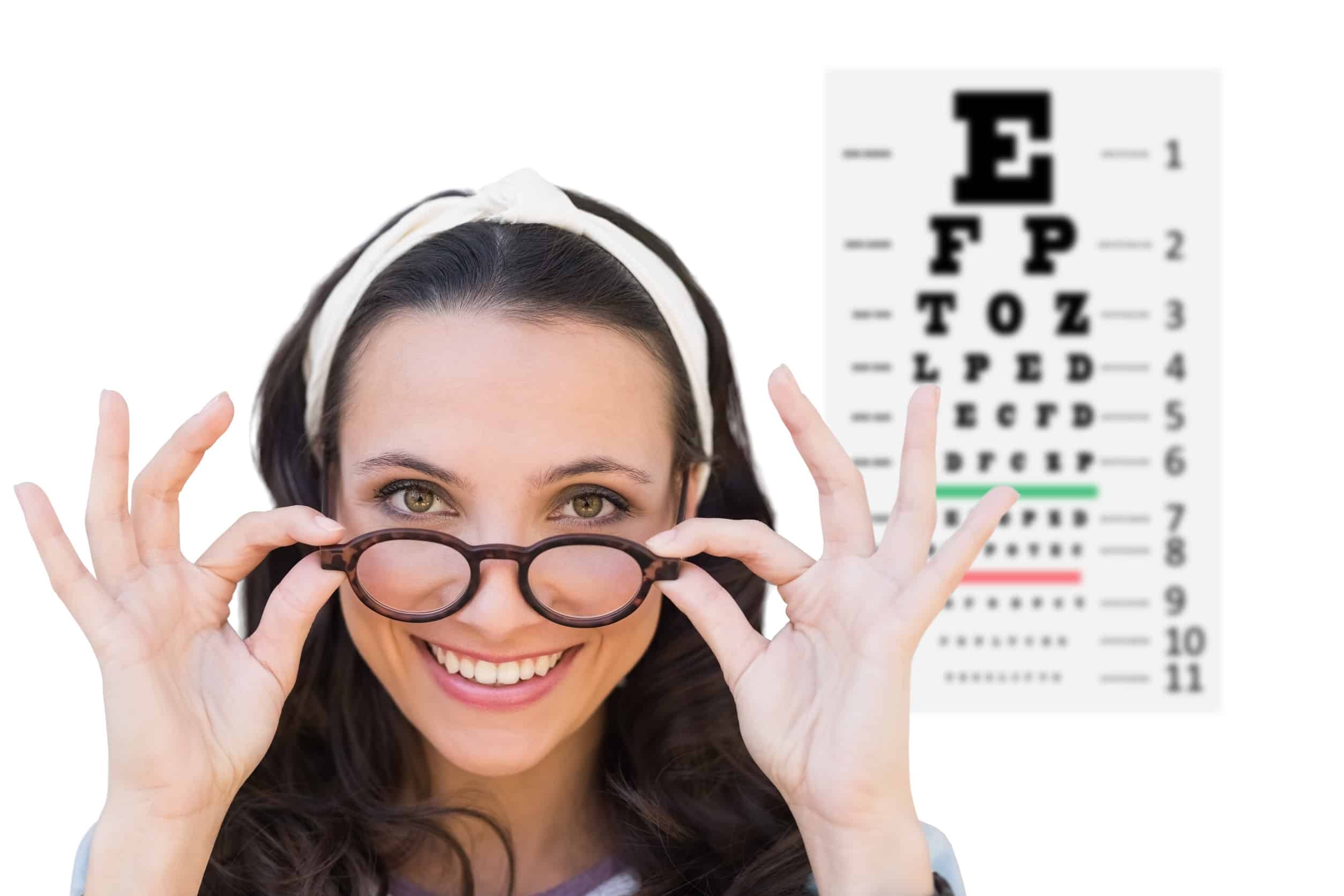 Brunette smiling at camera against eye test