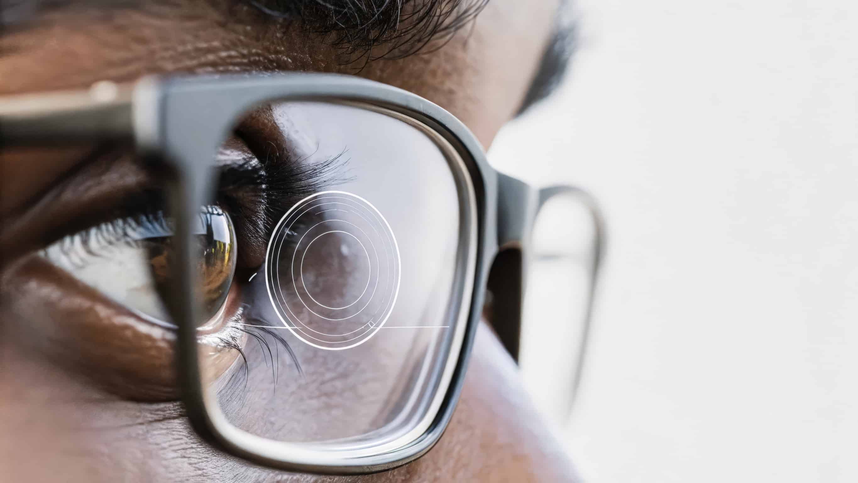 A close view of a human eye augmented with a digital overlay showcasing enhanced vision features such as augmented reality notifications and health indicators..